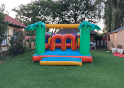Inflatable bounce house for children at Giggle Party event. Perfect for kids' entertainment and outd.